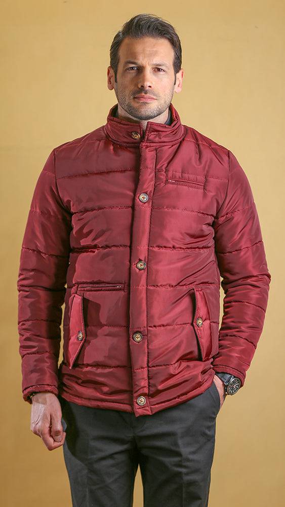 Crimson quilted bomber jacket with high collar, snap buttons, chest pocket and side pockets