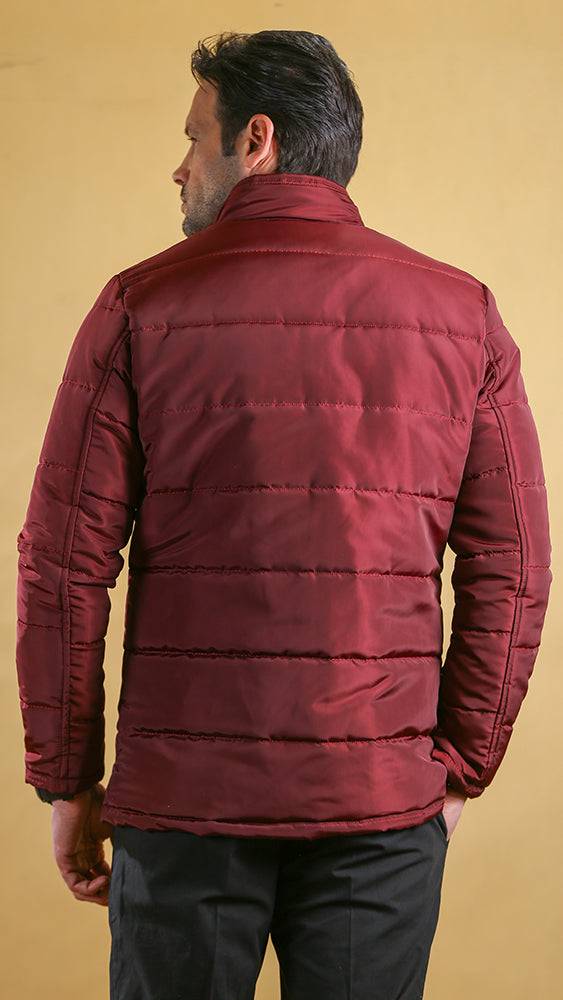 Crimson quilted bomber jacket back view with horizontal stitch lines and snap hem