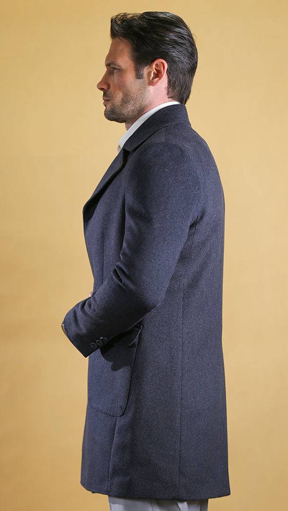 Men's dark overcoat side view with notched lapel and single-breasted front
