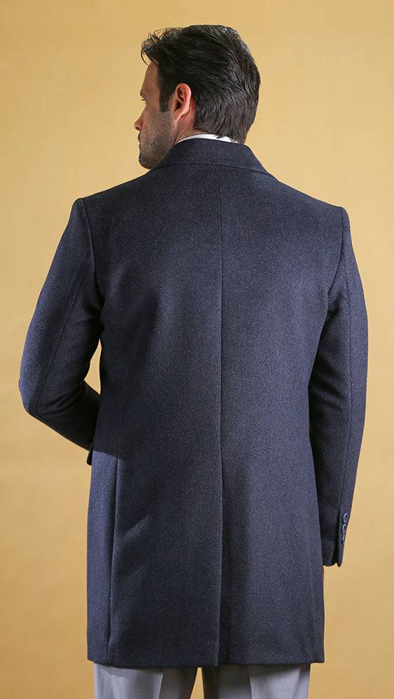 Men's dark overcoat back view with center seam and straight hem