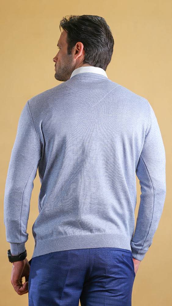 Powder blue v-neck knit sweater, back view with ribbed neckline and cuffs
