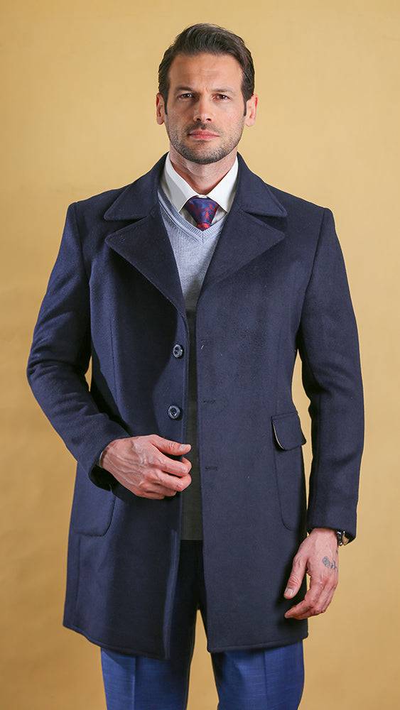 Men's navy overcoat with notched lapels and button front, welt pockets.