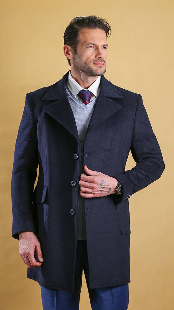 Men's navy overcoat with single-breasted button front and flap pockets.