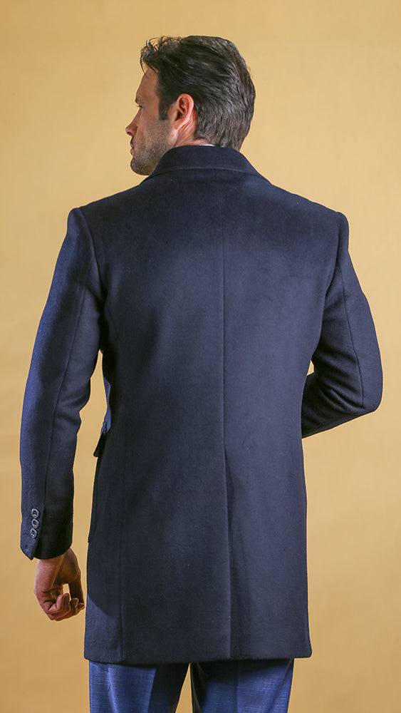 Men's navy overcoat back view with tailored seam and full sleeves.