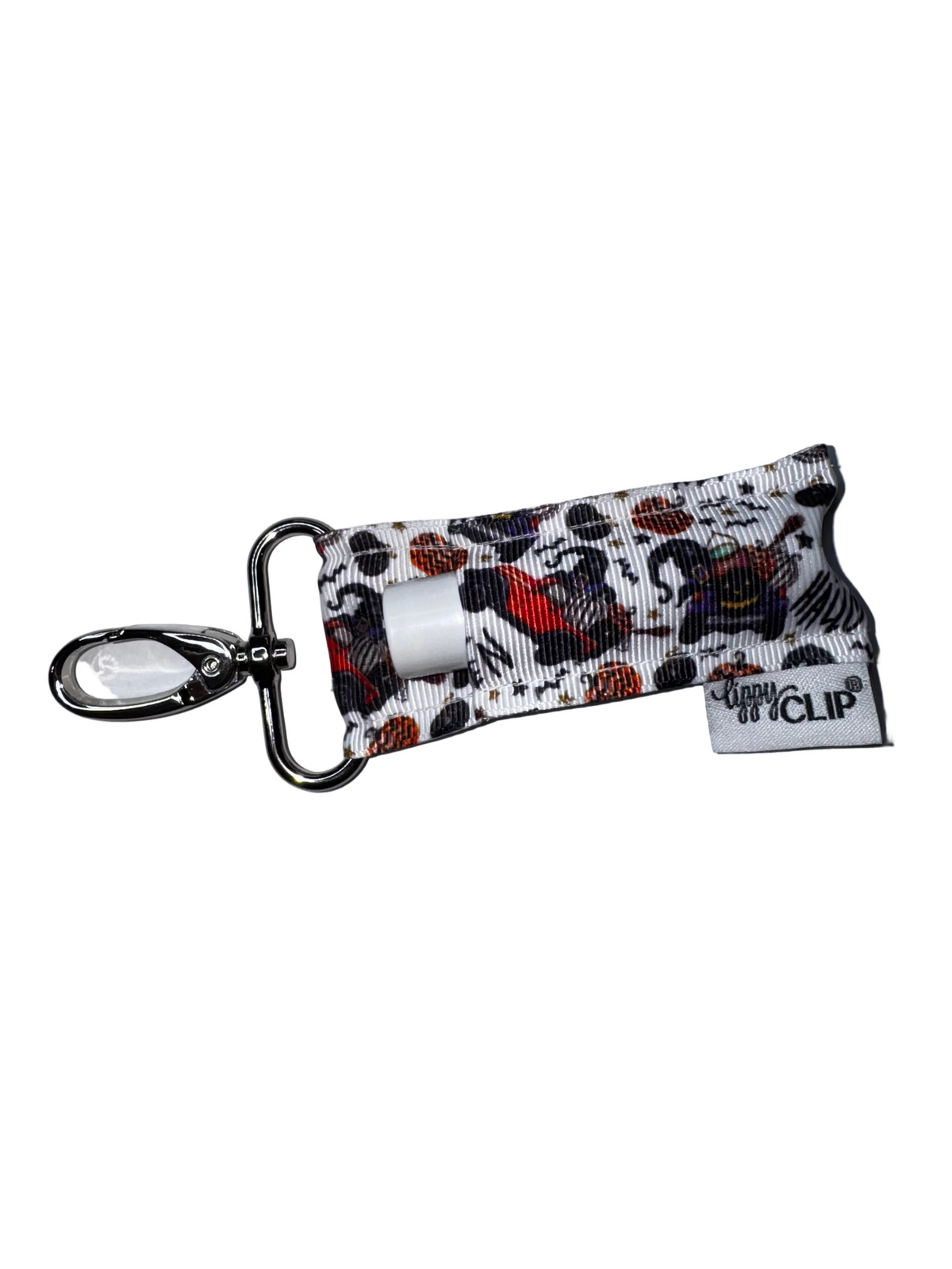 LippyClip lip balm holder with Halloween strap, white tube, and metal keychain clip