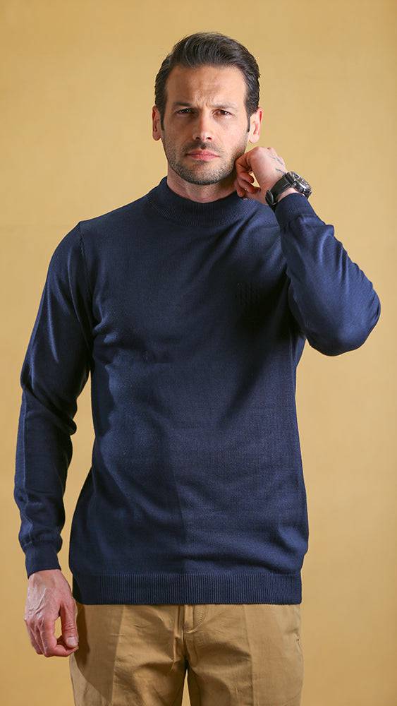 Cobalt blue crewneck sweater with ribbed neckline and hem, long sleeves.