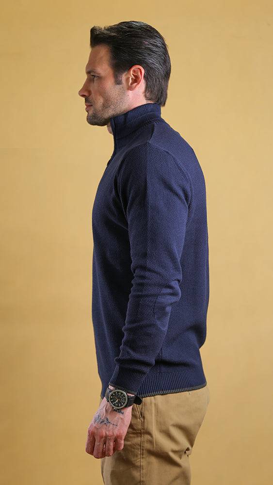 Navy quarter-zip sweater, side profile with ribbed cuffs and hem