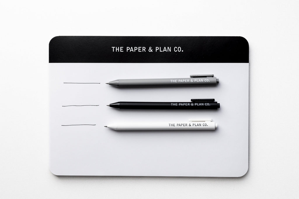 3-pack ballpoint pens on card backing, three aligned tips in black and gray
