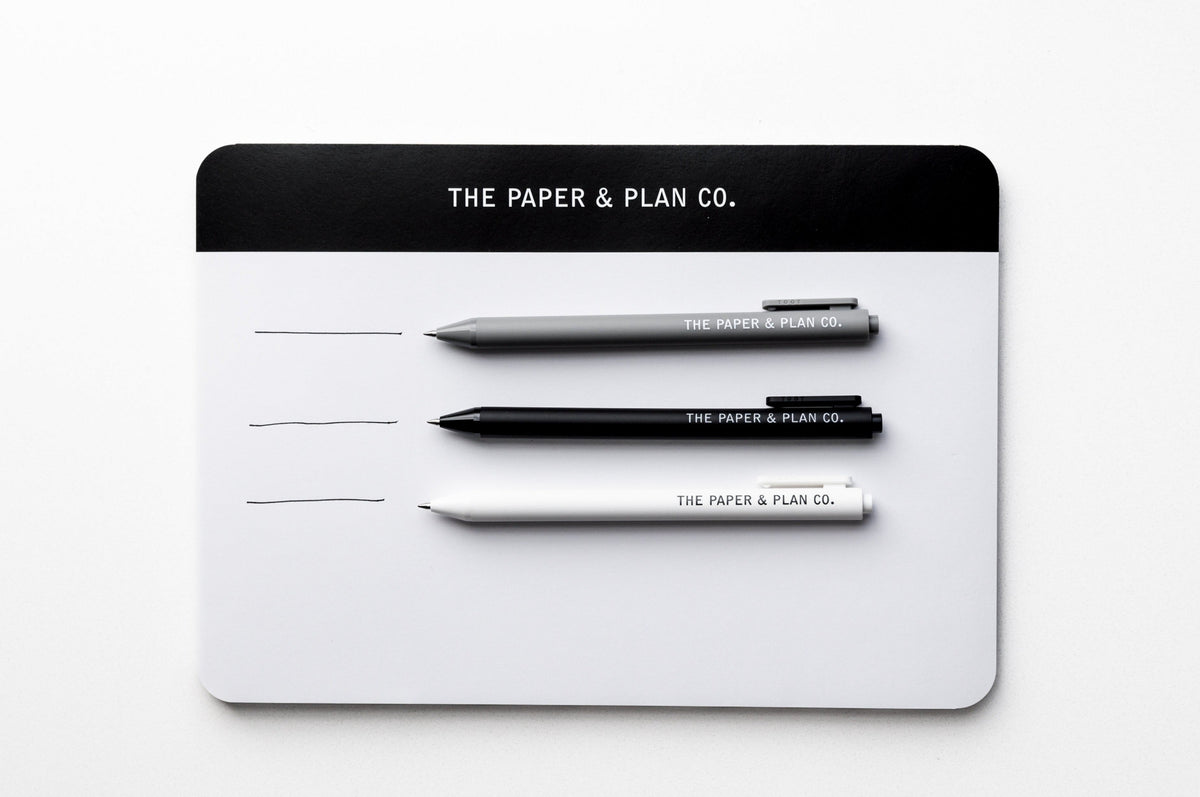 3-pack ballpoint pens on card backing, three aligned tips in black and gray