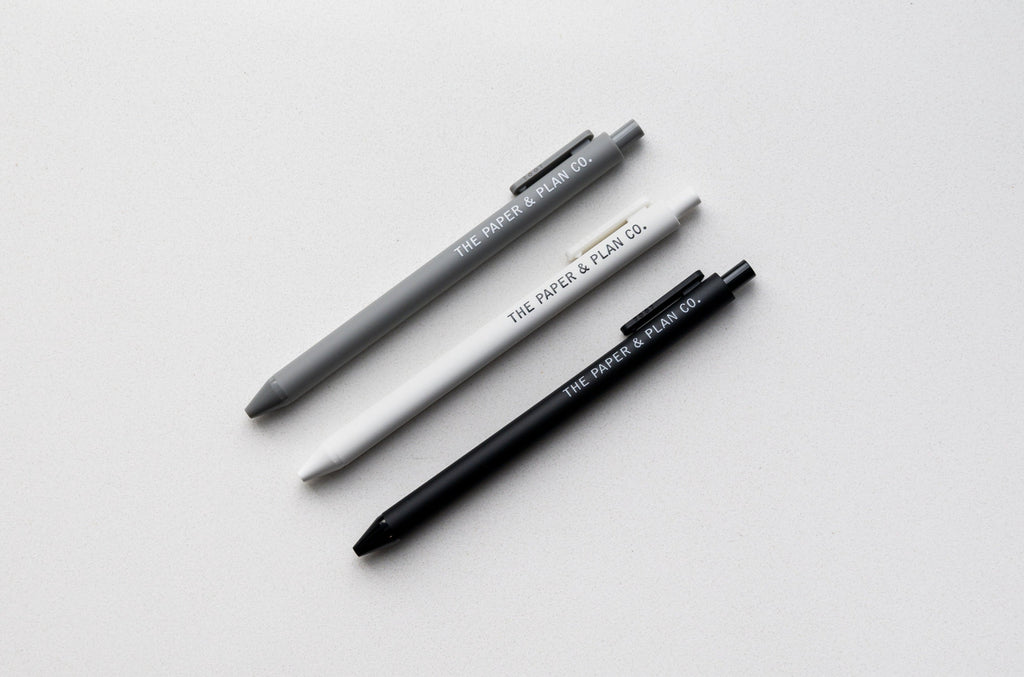 3-pack black and gray ballpoint pens with plastic clips and visible barrel text