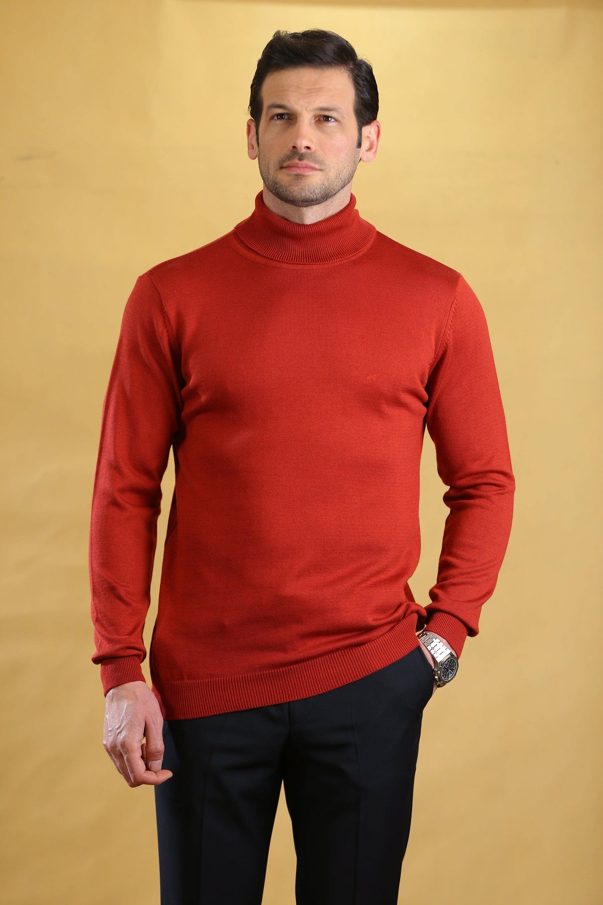Men's red turtleneck sweater with long sleeves, ribbed cuffs, and ribbed hem.