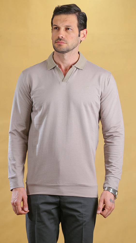 Men's long-sleeve essential polo in cream with ribbed collar and button placket