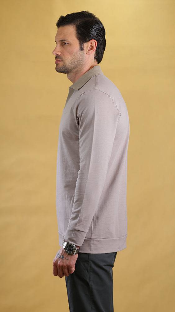 Cream long-sleeve polo shirt with collar and side profile