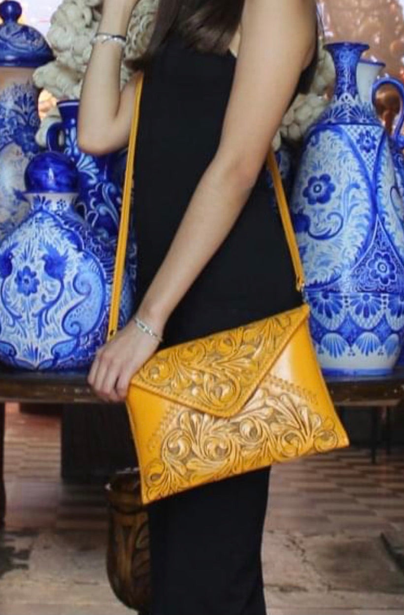 Hand-tooled leather crossbody & clutch bag, gold with carved floral emboss and short strap