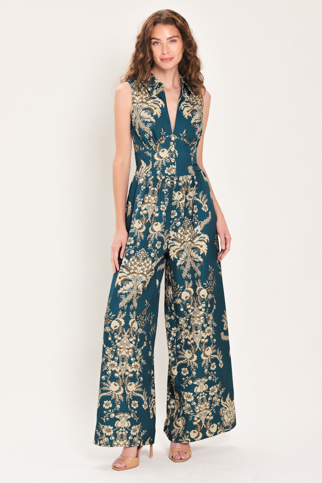 Teal printed sleeveless collared wide-leg jumpsuit with V-neck and gold floral print