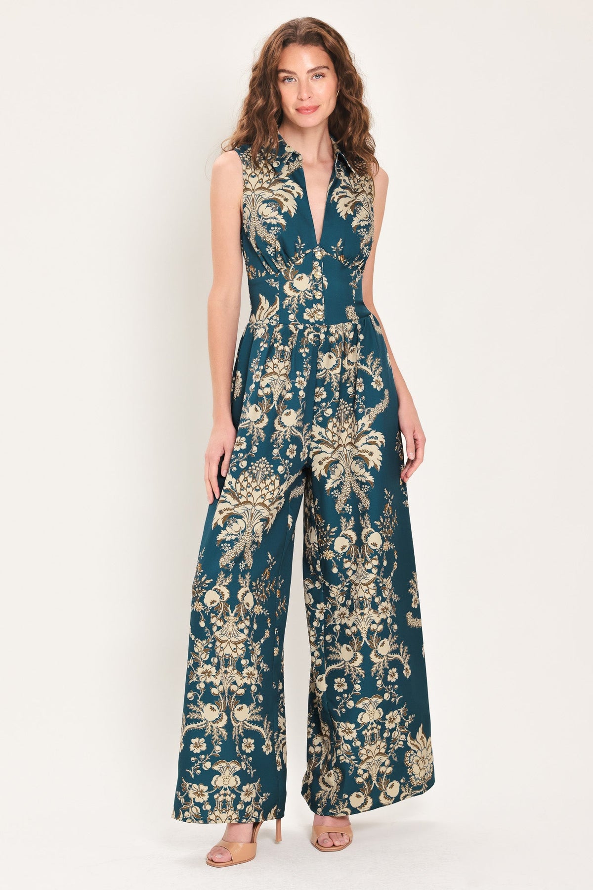 Teal printed sleeveless collared wide-leg jumpsuit with V-neck and gold floral print