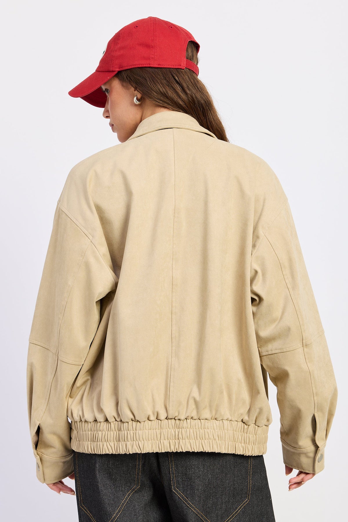 Light beige bomber jacket back view with ribbed elastic hem and cuffs