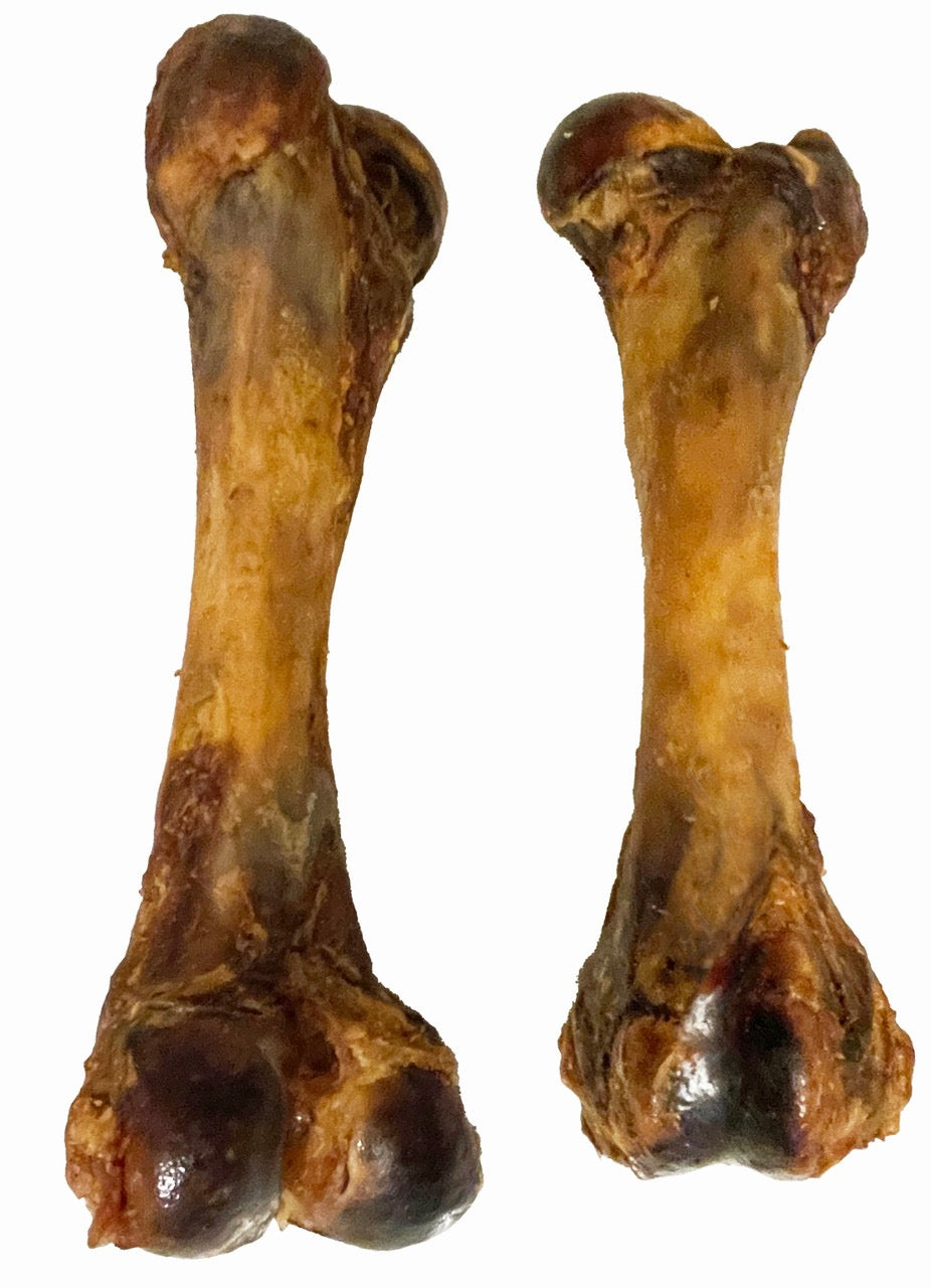 Two roasted pork ham bone dog treats, natural smoked brown