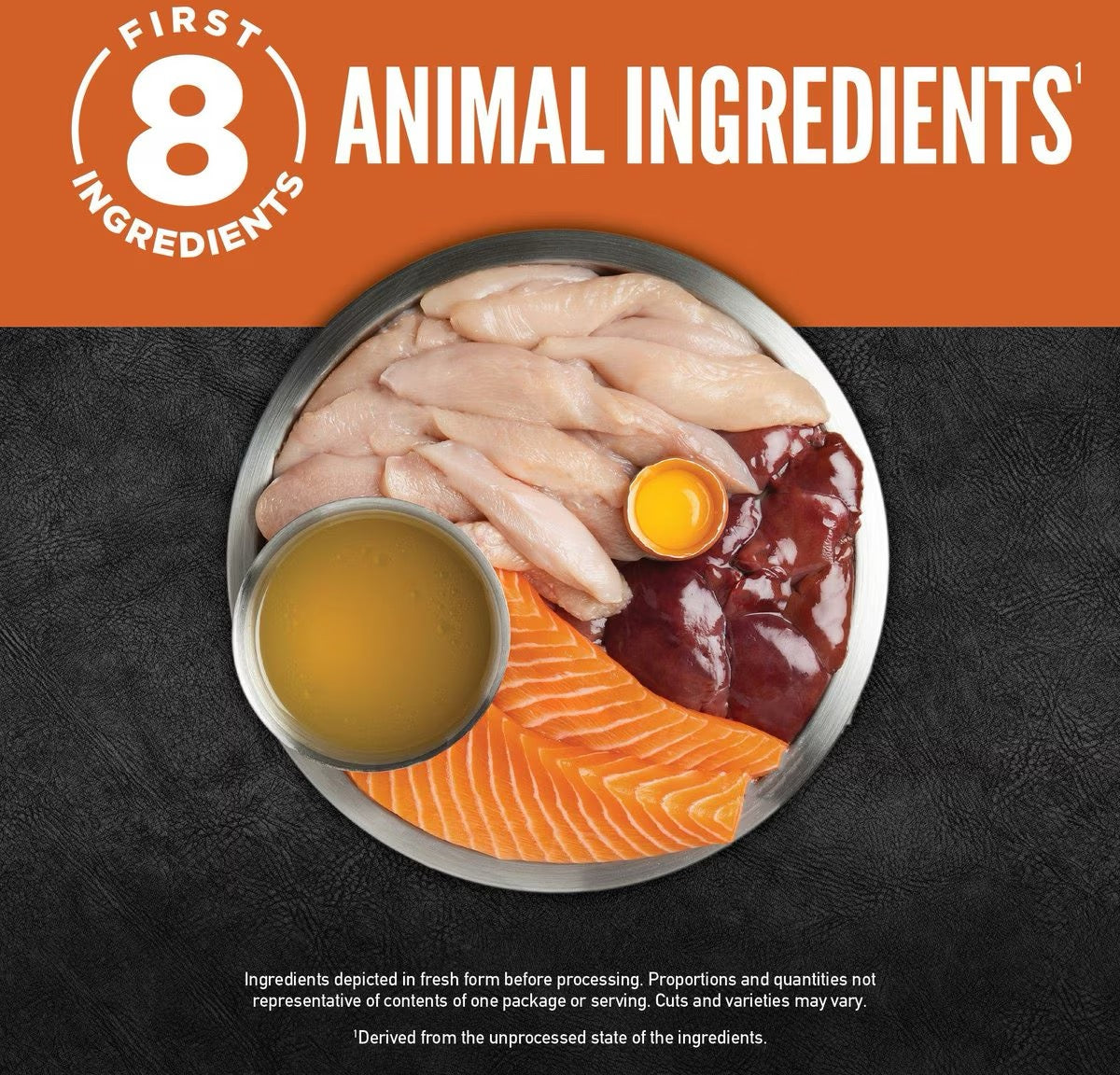Orijen wet cat food bowl with chicken pieces, salmon slices, and bone broth.