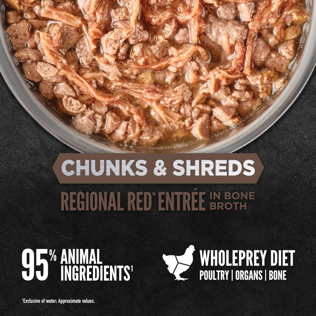 Bowl of wet cat food with chunky shreds in brown broth