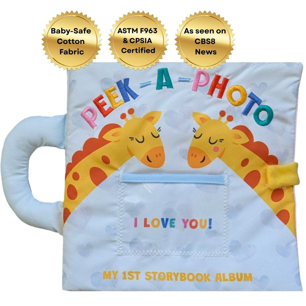 Peek-A-Photo storybook album with blue cloth cover, giraffe art, and photo window panel