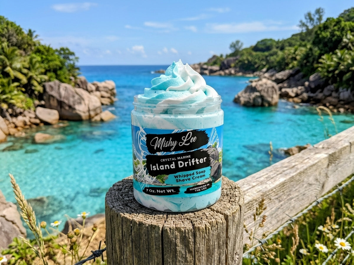 Whipped soap and shave cream jar with turquoise foam on outdoor log by the water