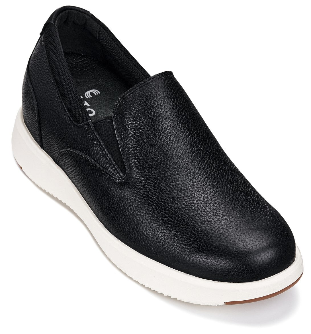 Black leather slip-on loafer with white sole, side view
