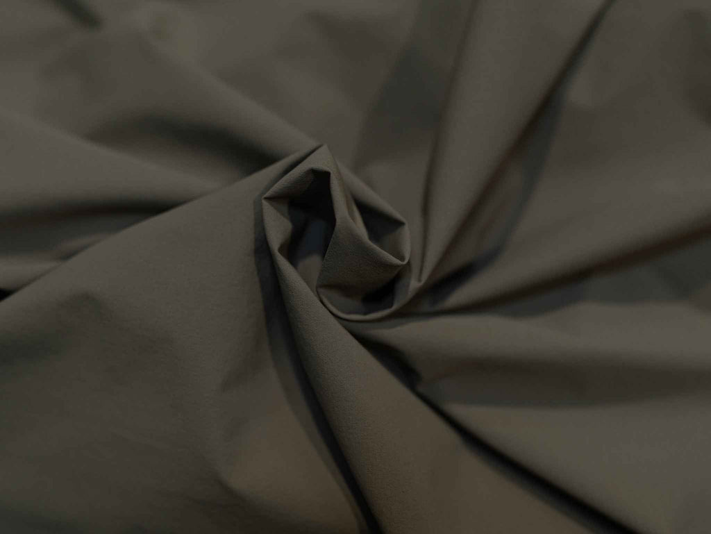 Journey jacket fabric close-up with textured weave and subtle sheen