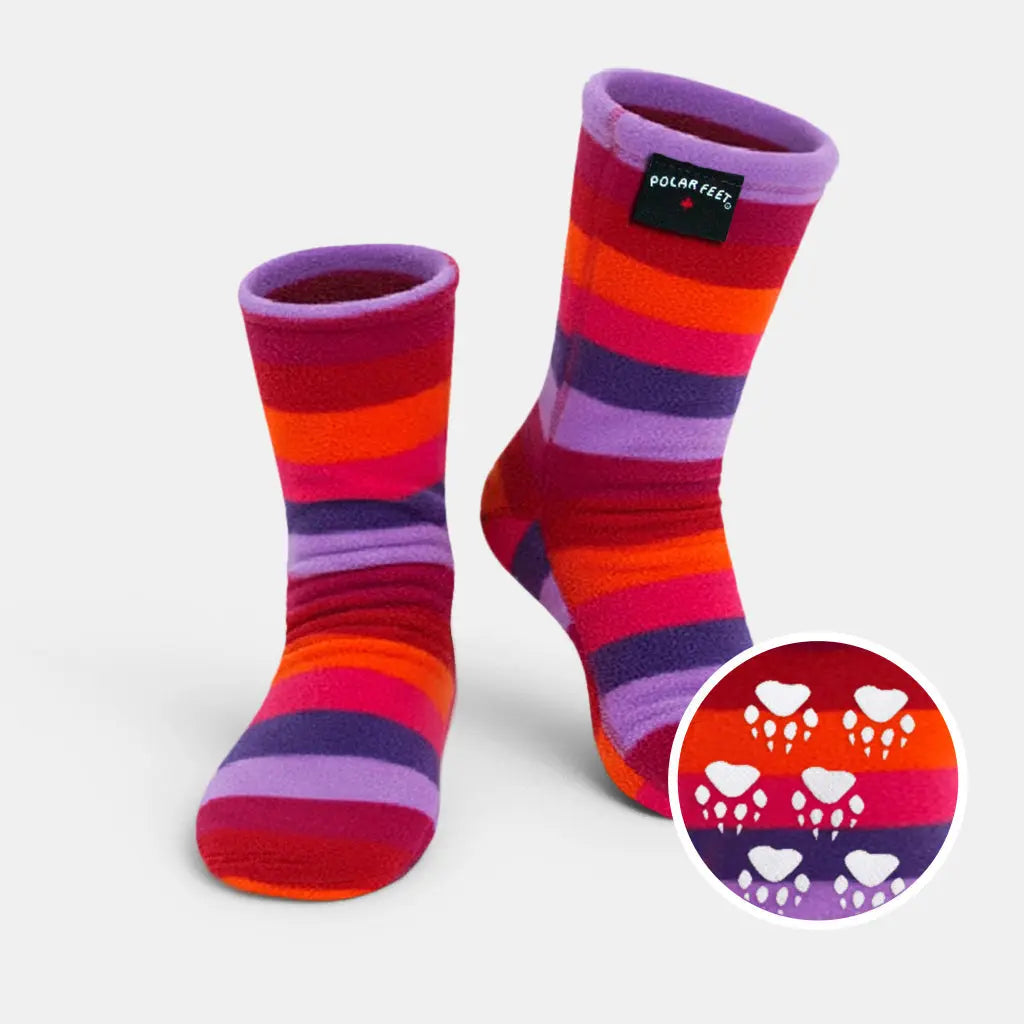Multicolor striped fleece socks with Polar Feet label and paw print accent