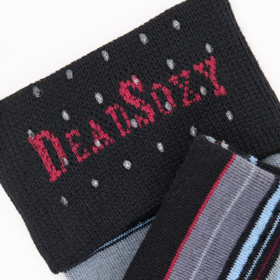 Black socks with red "Jett" lettering and dotted pattern accents