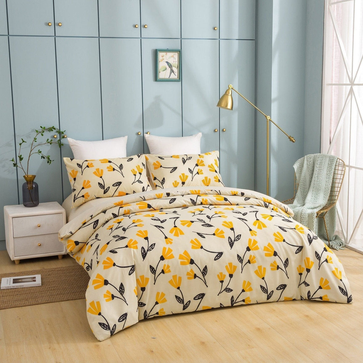 Yellow tulip floral duvet cover set with pillow shams and neatly tucked corners