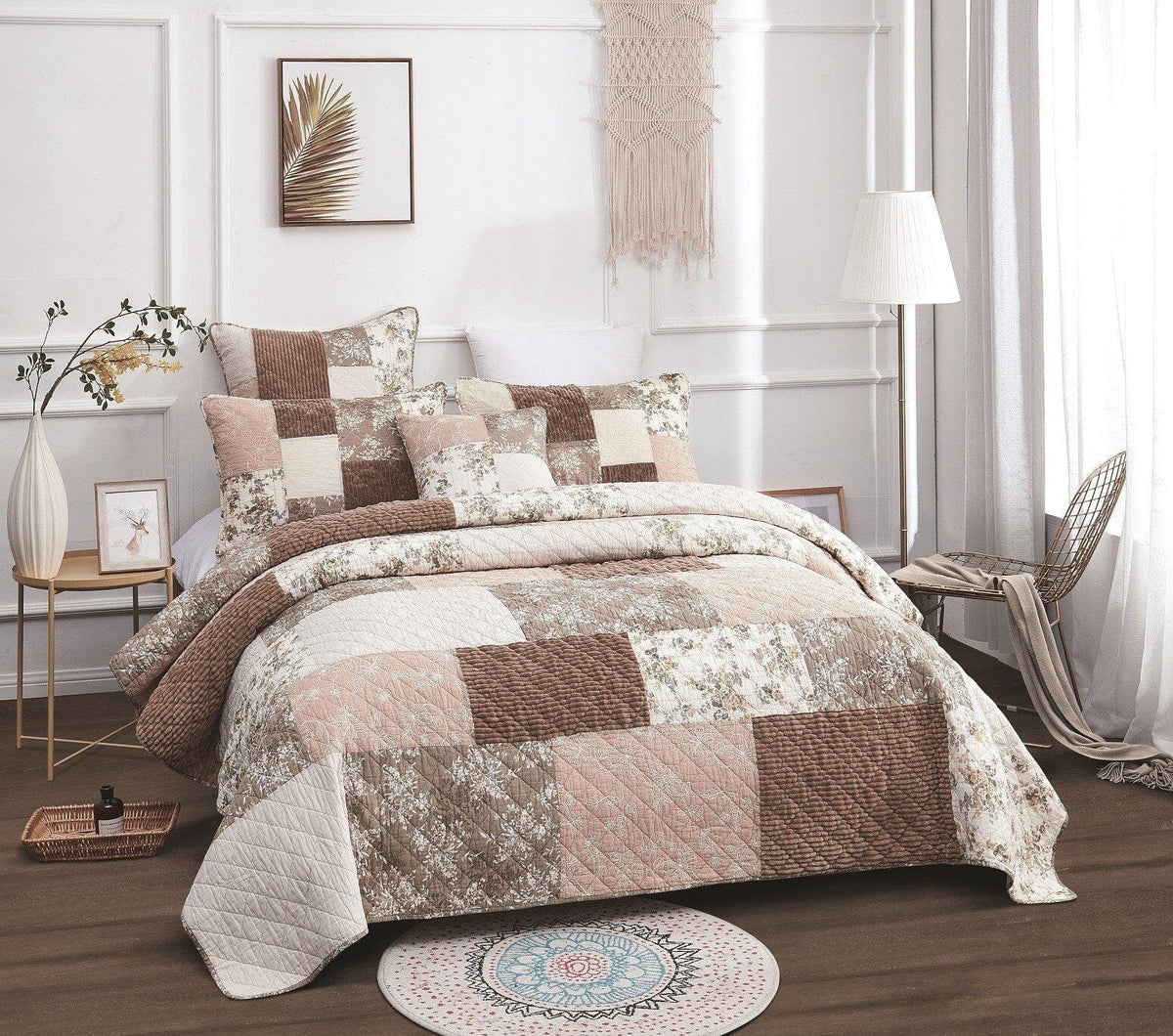 Quilted bedspread with floral patchwork blocks and textured brown edge