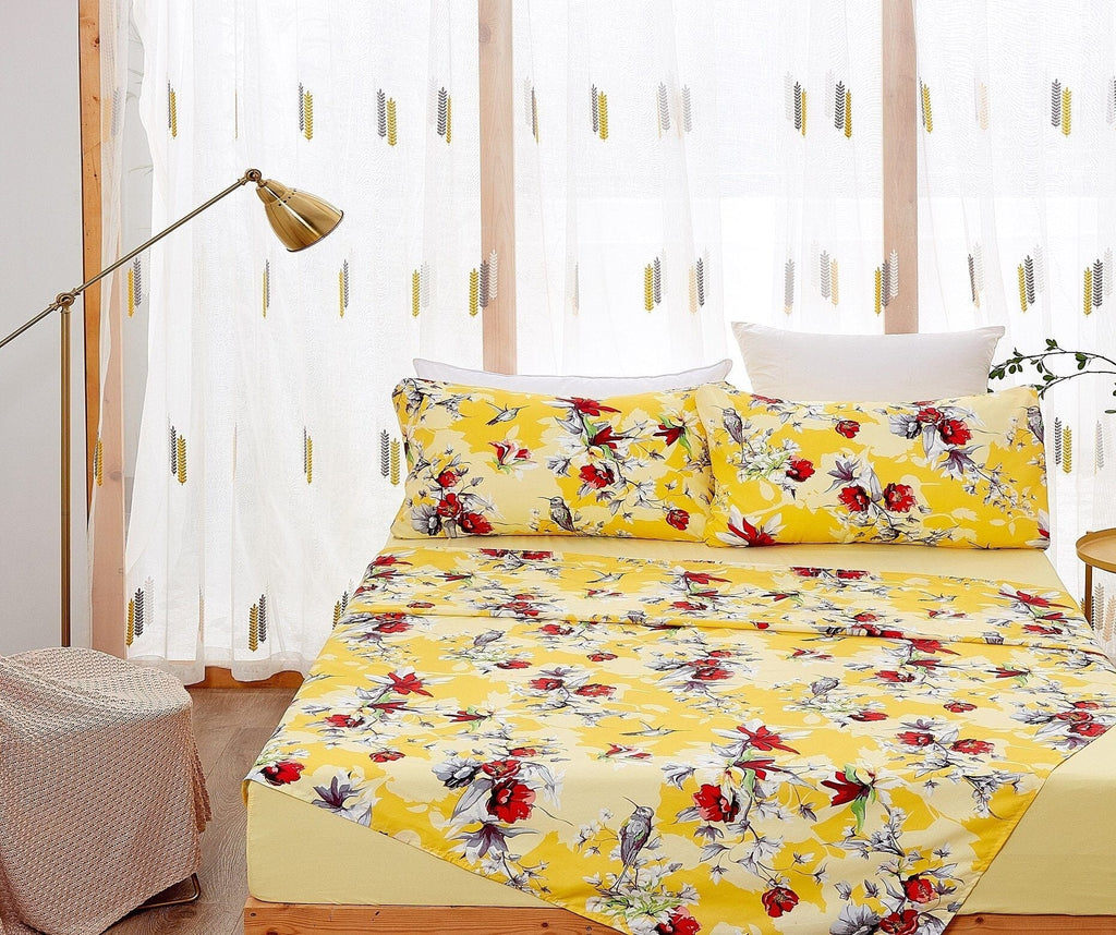 Yellow hummingbird and floral bed sheet set with two pillowcases and fitted sheet