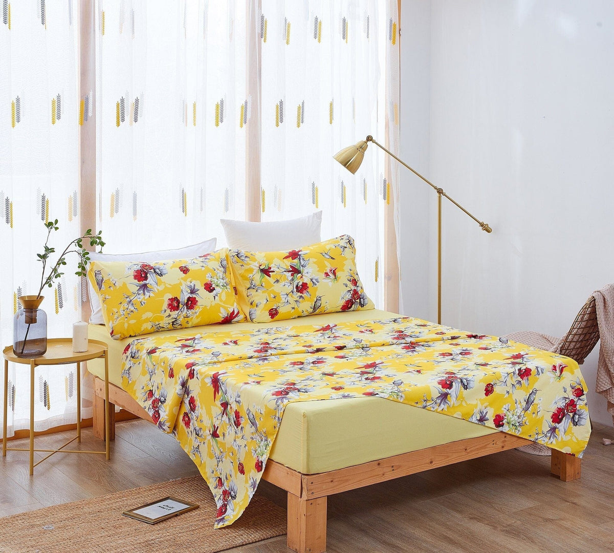 Yellow hummingbird and floral bed sheet set with two pillowcases