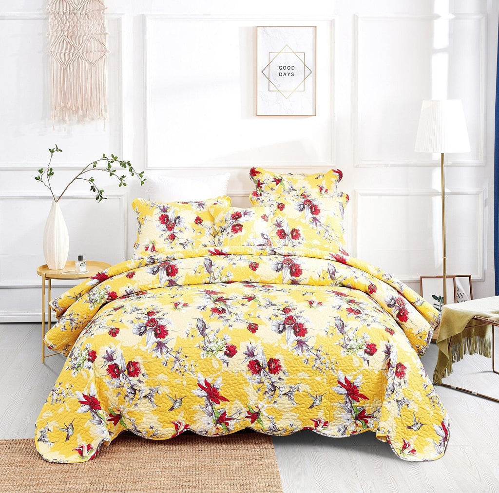Sunshine yellow floral quilt set with hummingbird and pillow shams, full bed styling