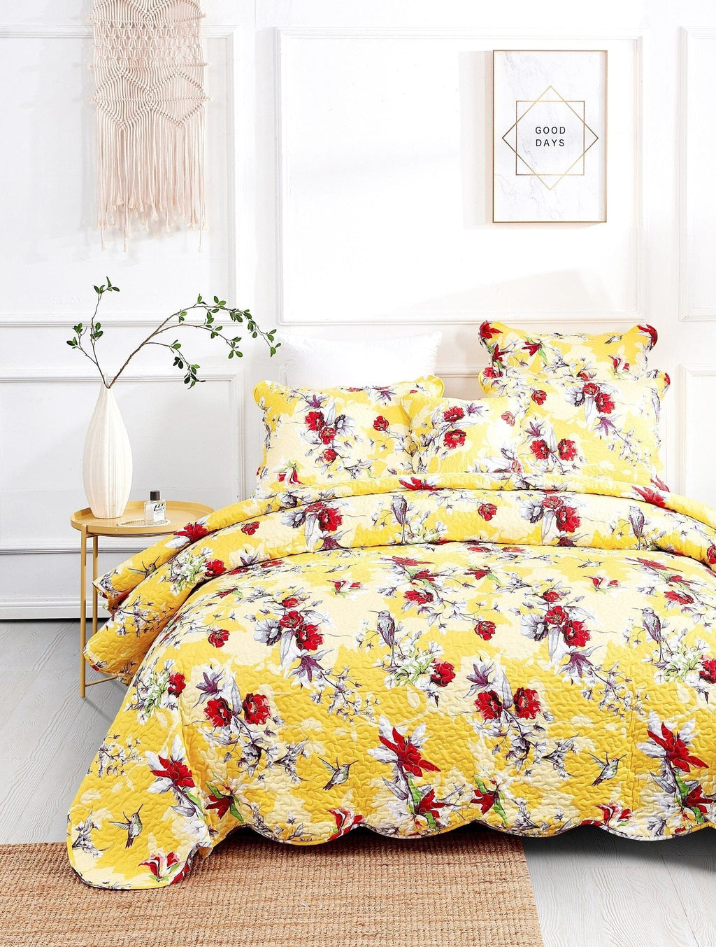 Sunshine yellow floral quilt set with hummingbirds and coordinated pillow shams
