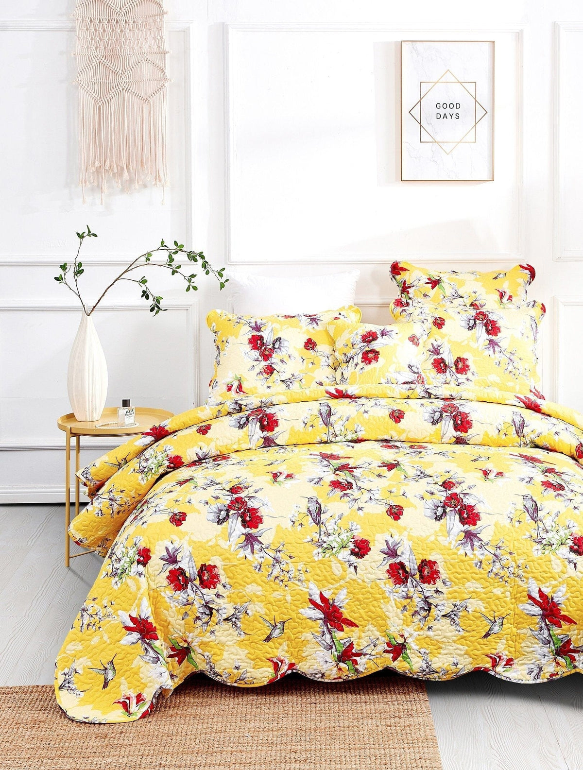 Sunshine yellow floral quilt set with hummingbirds and coordinated pillow shams