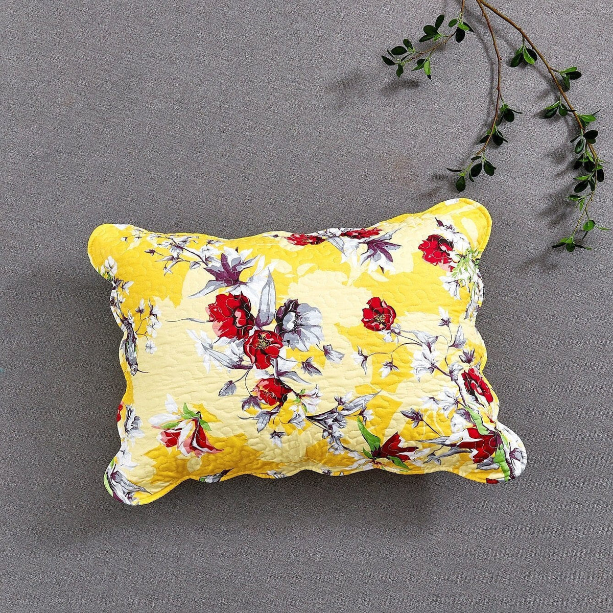 Yellow floral hummingbird pillow sham with stitched quilting detail