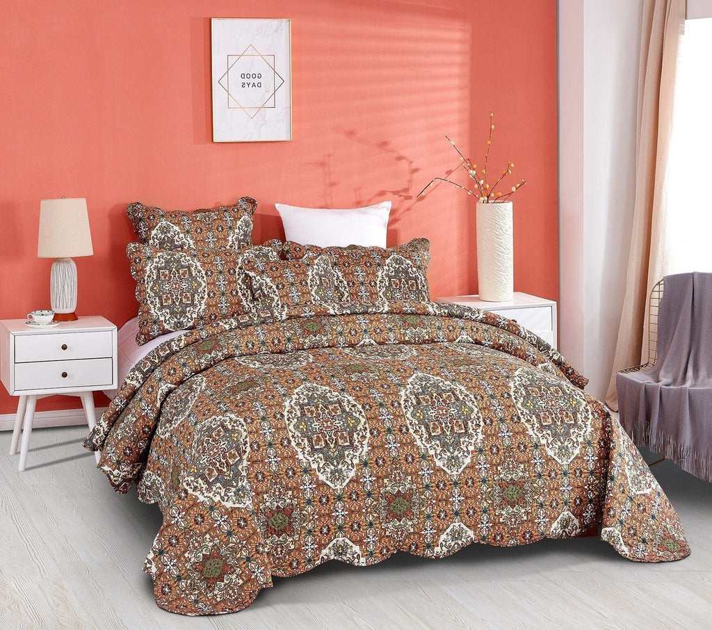 Quilted bedspread and sham set in earthy tones with ornate medallion design