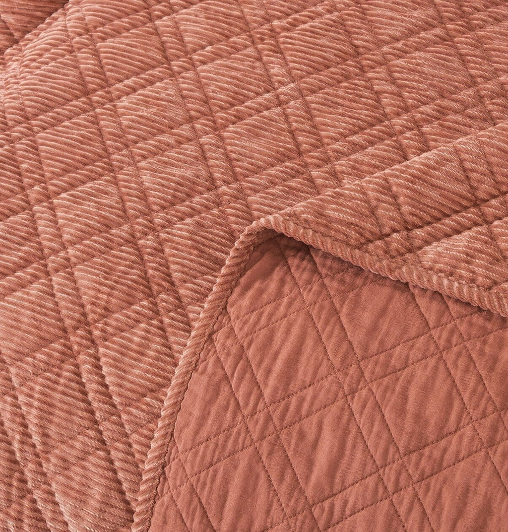 Terracotta coral quilted velour corduroy with stitched edge detail