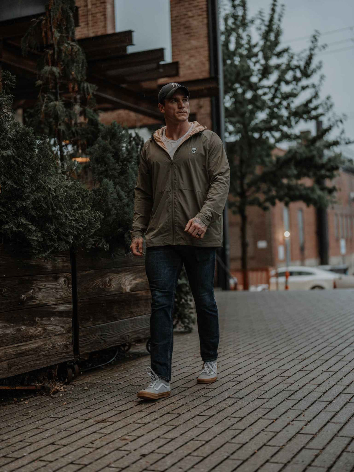 Men's Journey jacket in olive with zip front, hood, and two front pockets