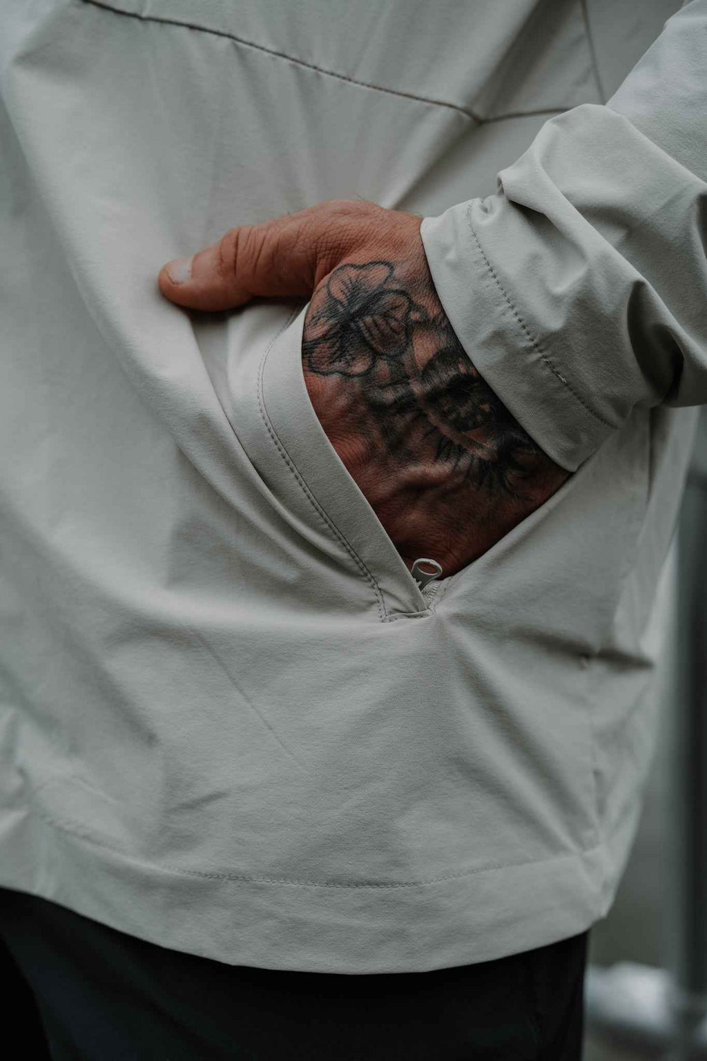 Men's Journey Jacket light gray; stitched pocket opening detail on front