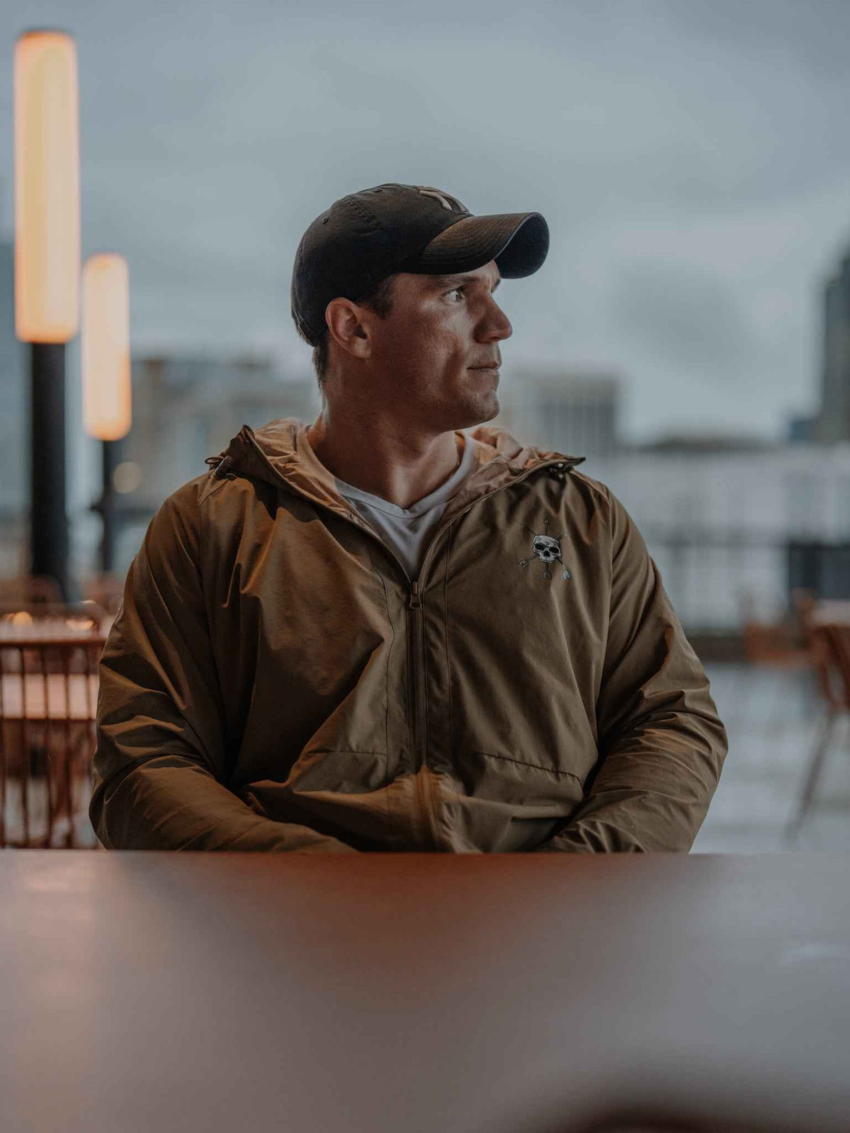 Men's journey jacket, brown hooded parka with front zip and chest logo patch
