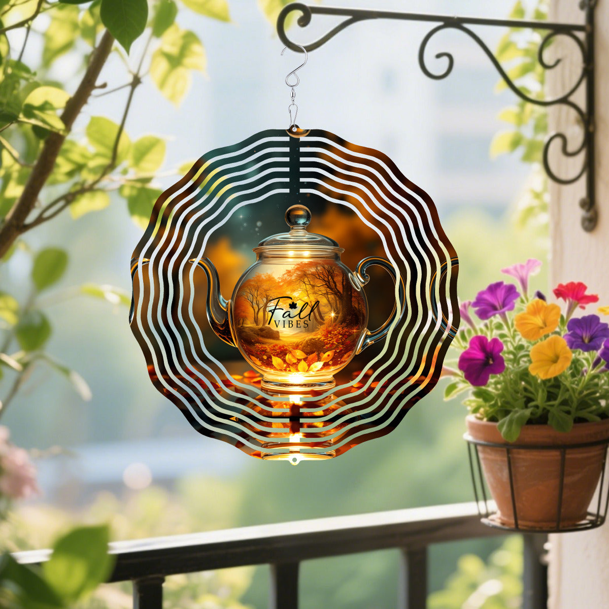 Brown tea kettle wind spinner with concentric swirl metal blades and hanging hook