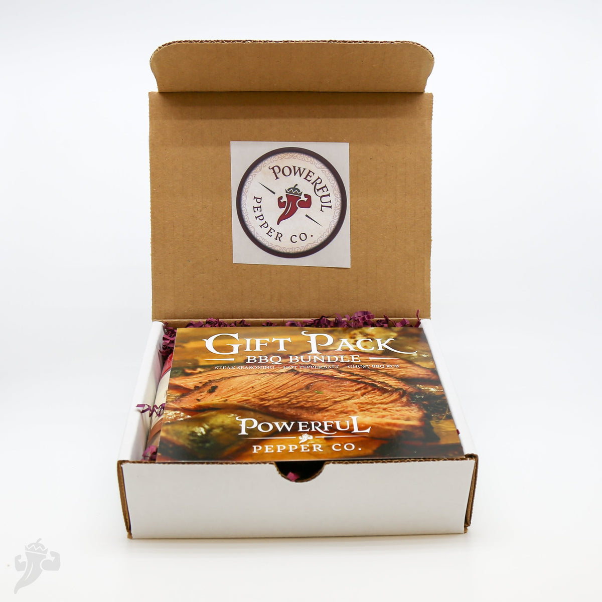 BBQ spice gift pack in open kraft box with logo label and seasoning packet