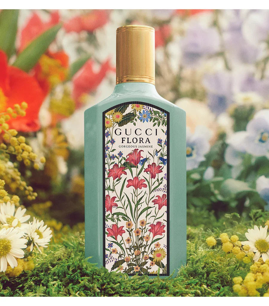 Gucci Flora Gorgeous Jasmine eau de parfum bottle with floral label and gold cap