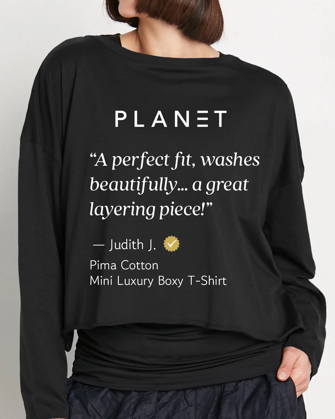 Black boxy long-sleeve crewneck T-shirt with 'PLANET' back print