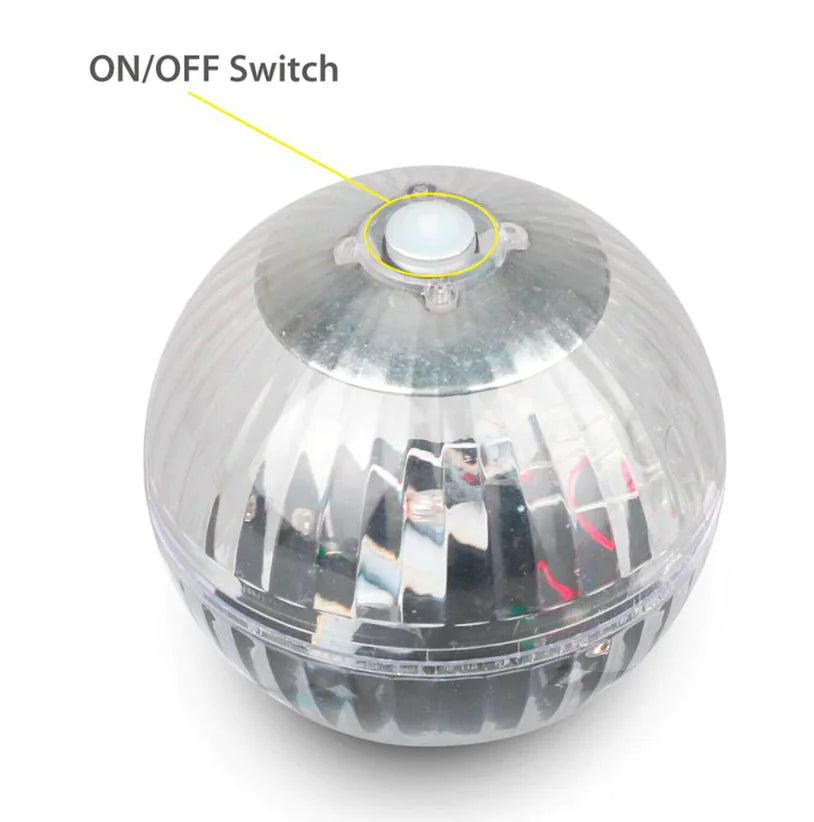 Clear solar LED floating lamp globe with on/off switch area highlighted