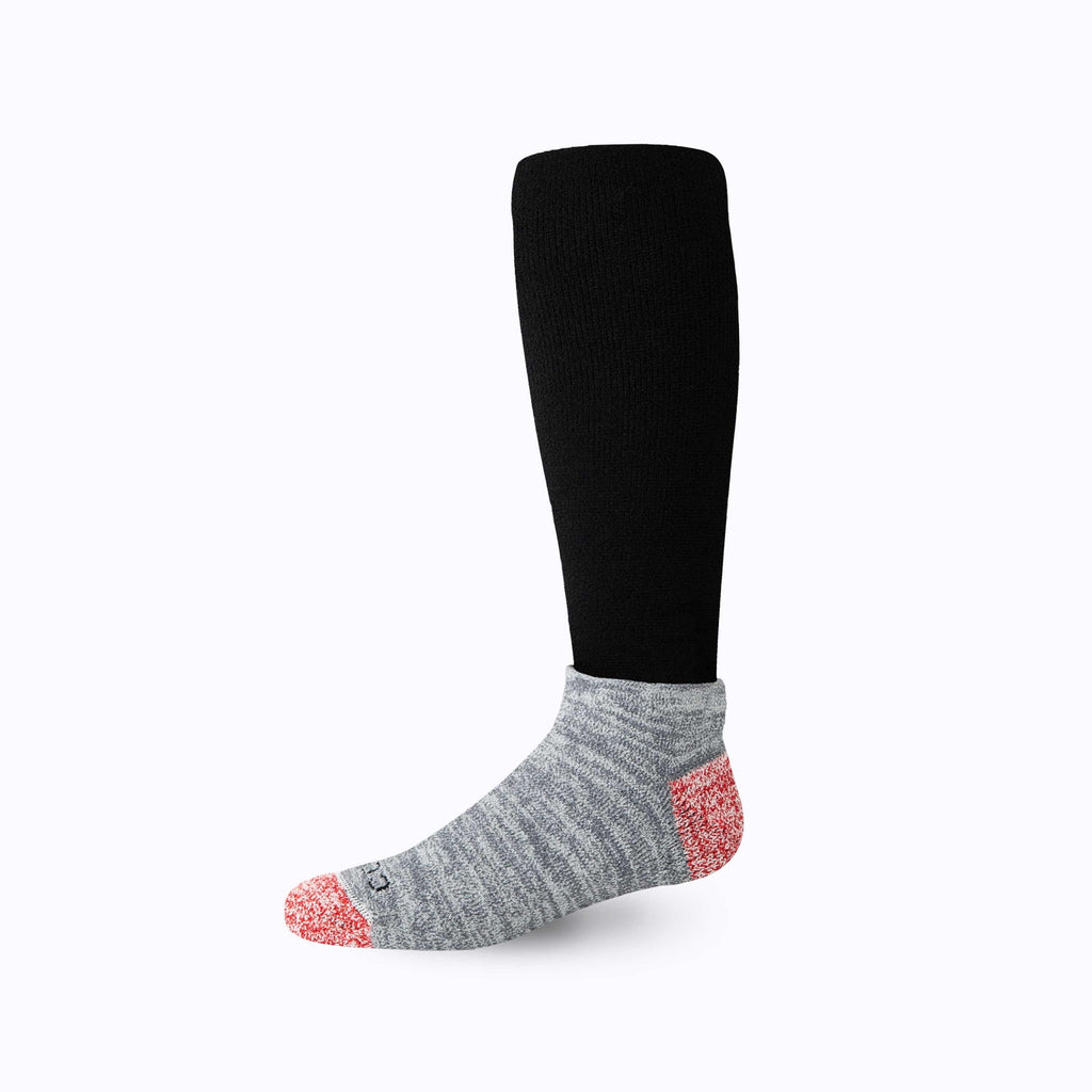 CozyGrip compression slipper sock, black leg with gray foot and red speckled grip toe