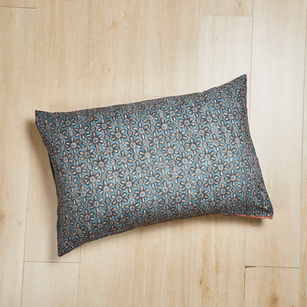 Dark teal rectangular pillowcase with light floral lattice watercolor design